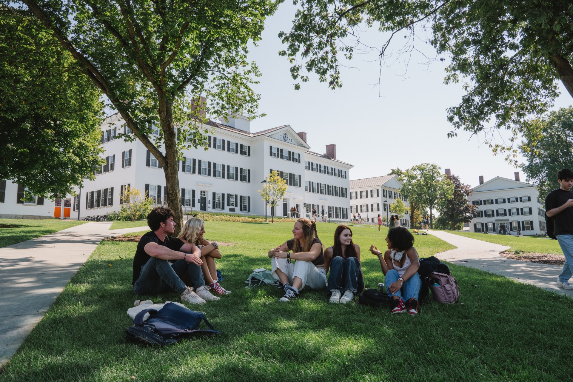 Students sitting on lawn