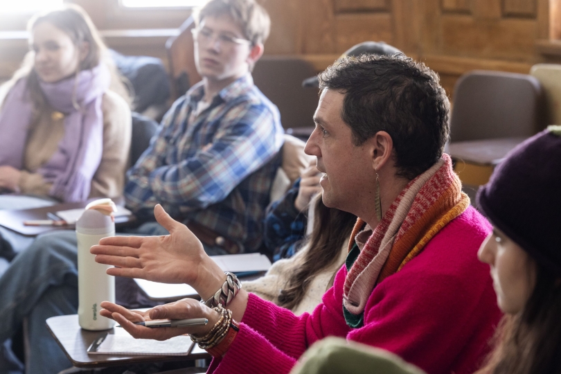 César Alvarez leads a discussion of student performances