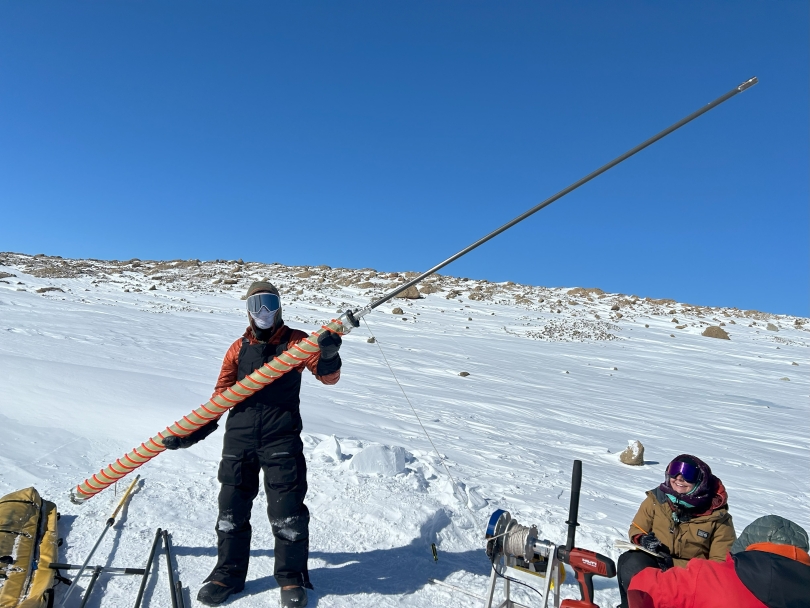 Chalif holds the tool used to drill into the ice