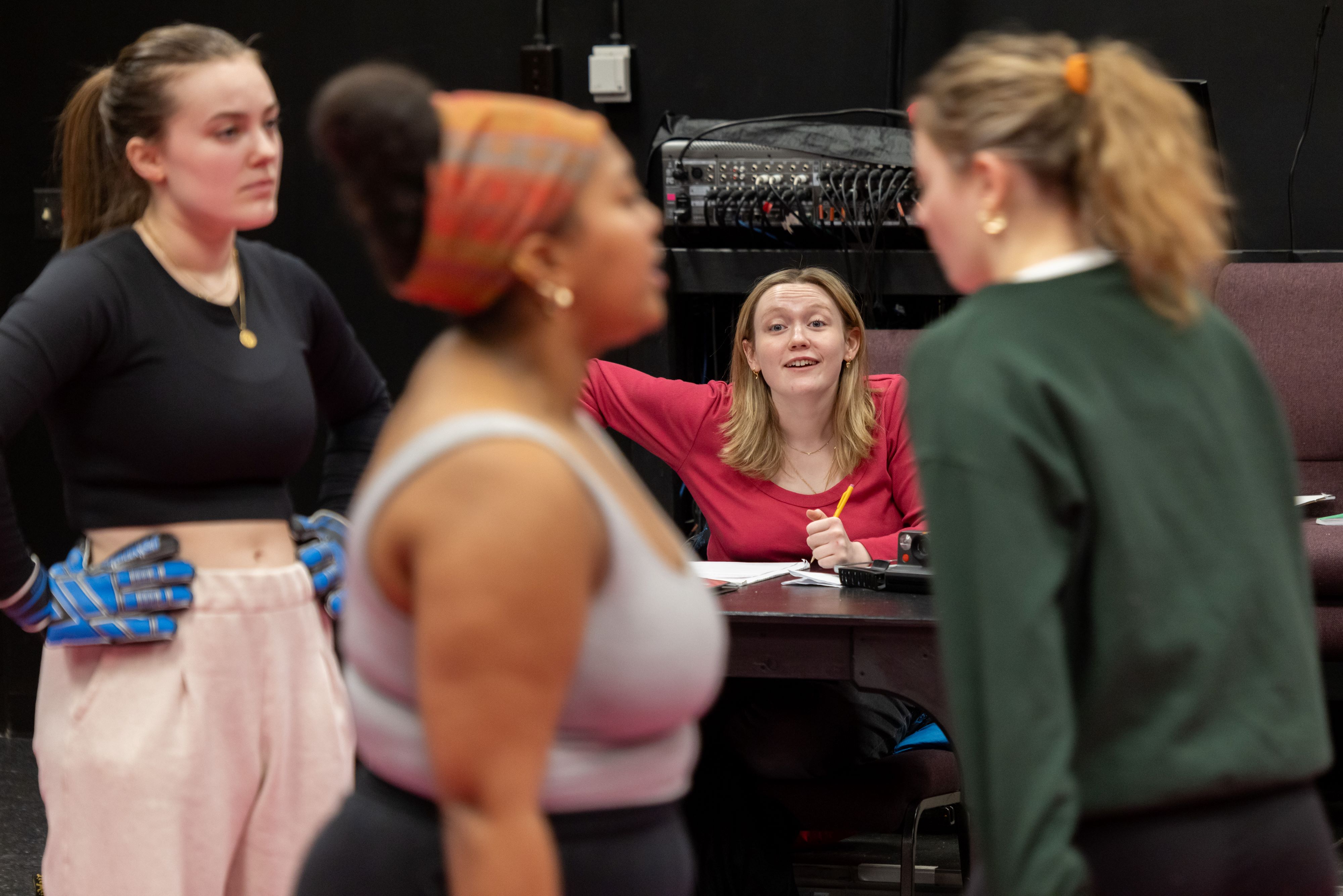 Lily Easter '25 directing a rehearsal of "The Wolves"