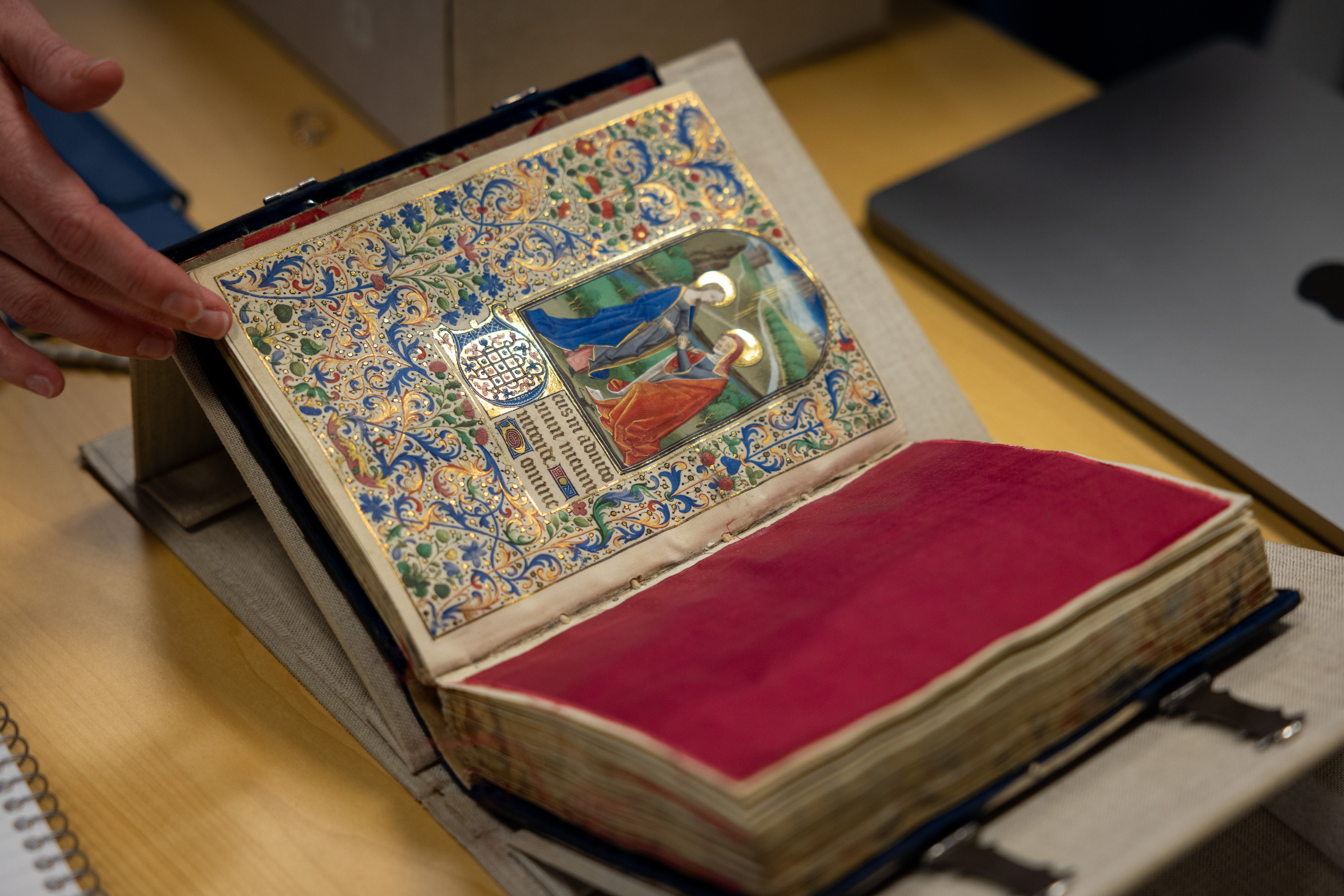 This 15th-century book of hours contains 13 full-page illuminations depicting biblical scenes. The blue velvet binding is housed in an 18th-century box with French royal arms. 
