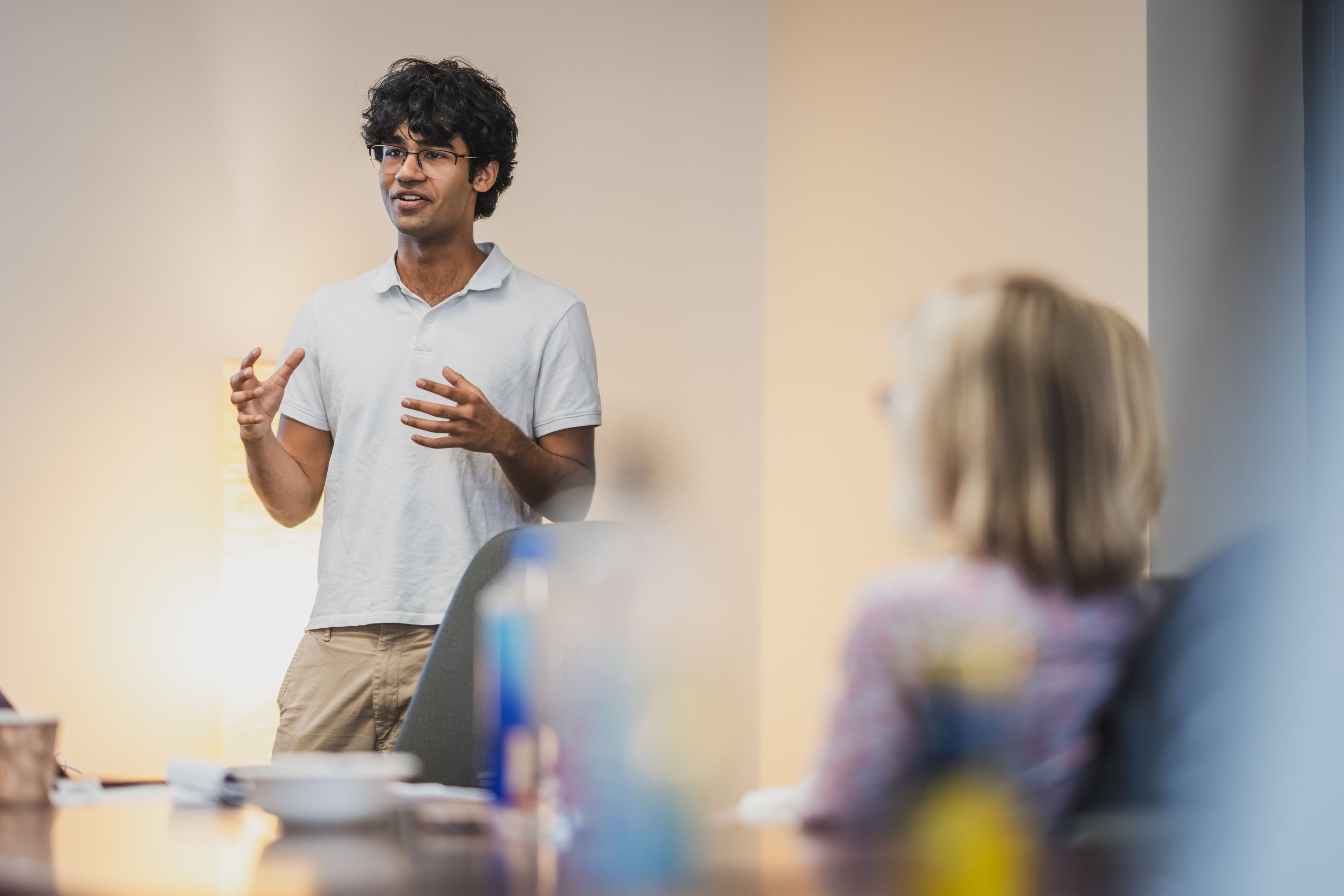 Rohan Taneja ’28 delivers his C19 presentation.
