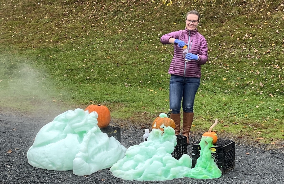 Chemistry professor with pumpkins