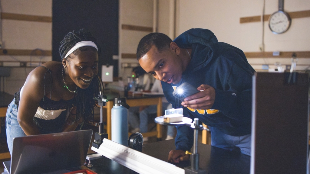 Two students at a microscope