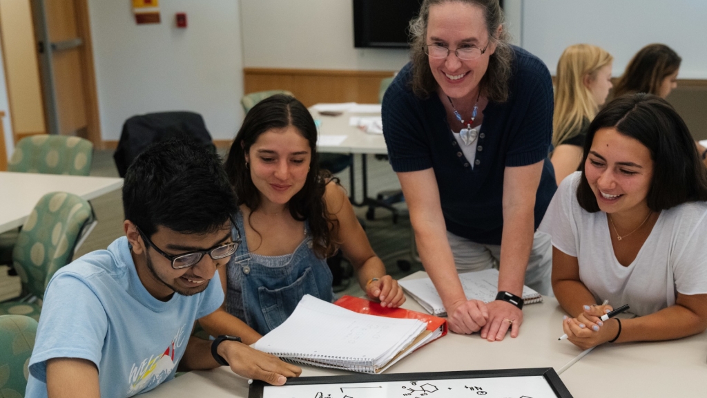 Teacher and three students