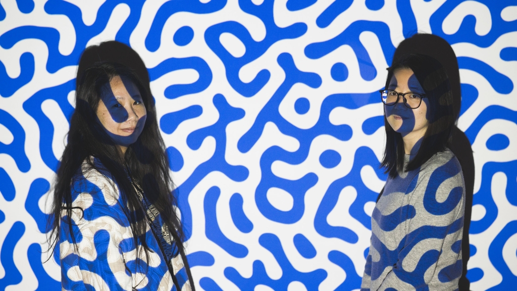 Theresa Ong and Chenyang Su overlayed with project of blue and white patten