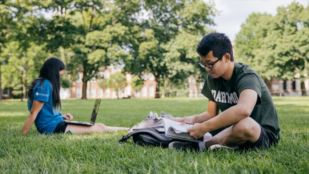 Students reading on the Green