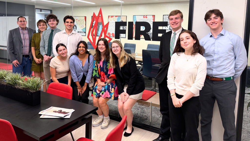 Democracy Fellows pose with Ronnie London