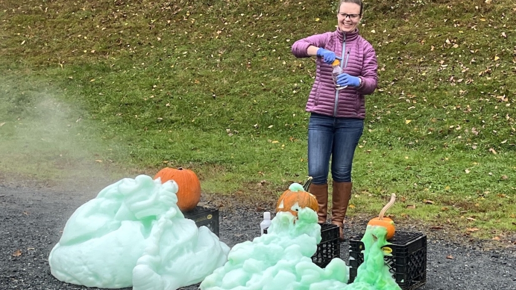 Chemistry professor with pumpkins